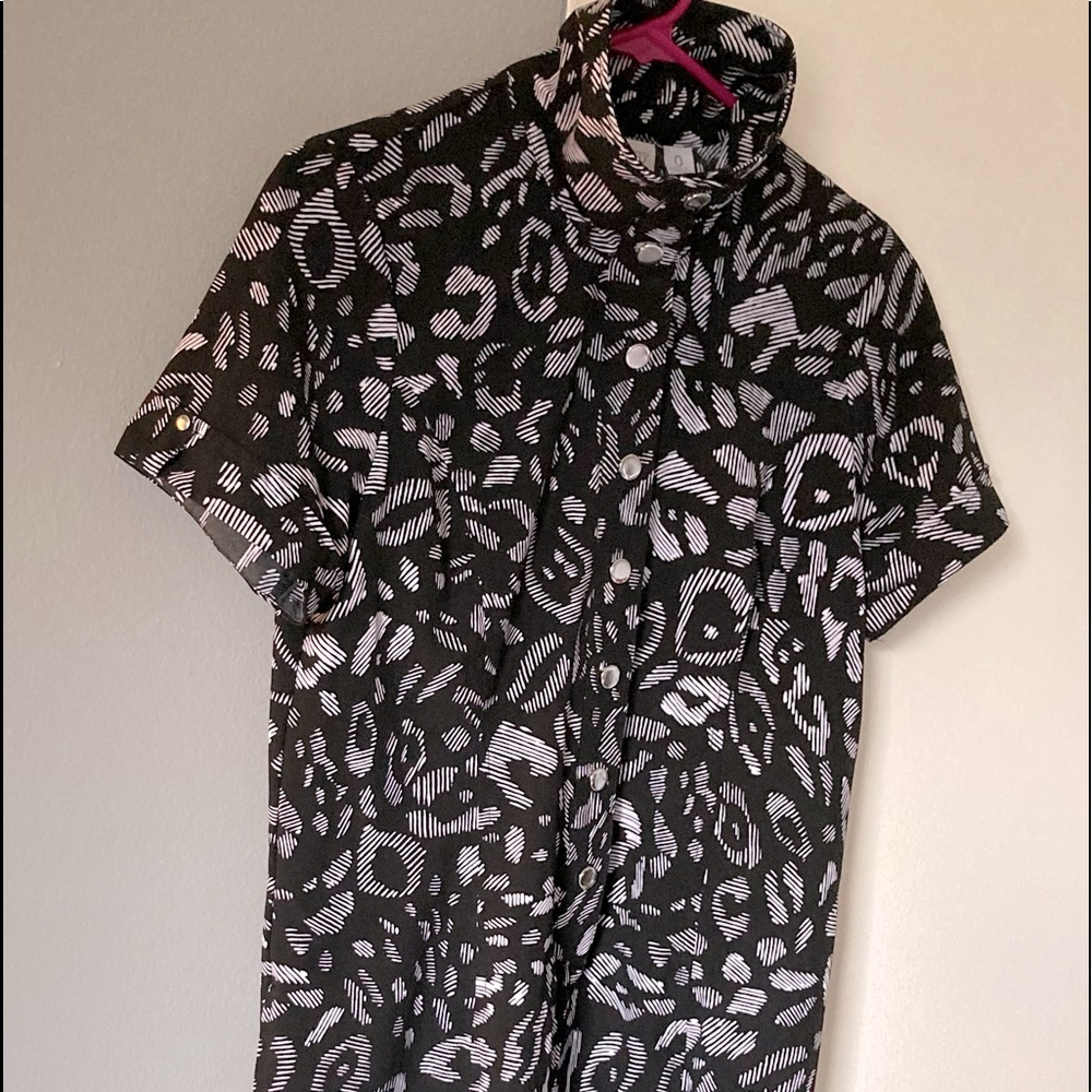 Street wear dress/tunic top. Pops with boots, heels or flat